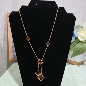 Elegant Gold and Black Clover Necklace Tigers Eye